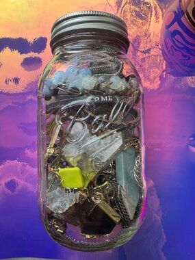 Mason Jar Filled with Assorted Jewelry